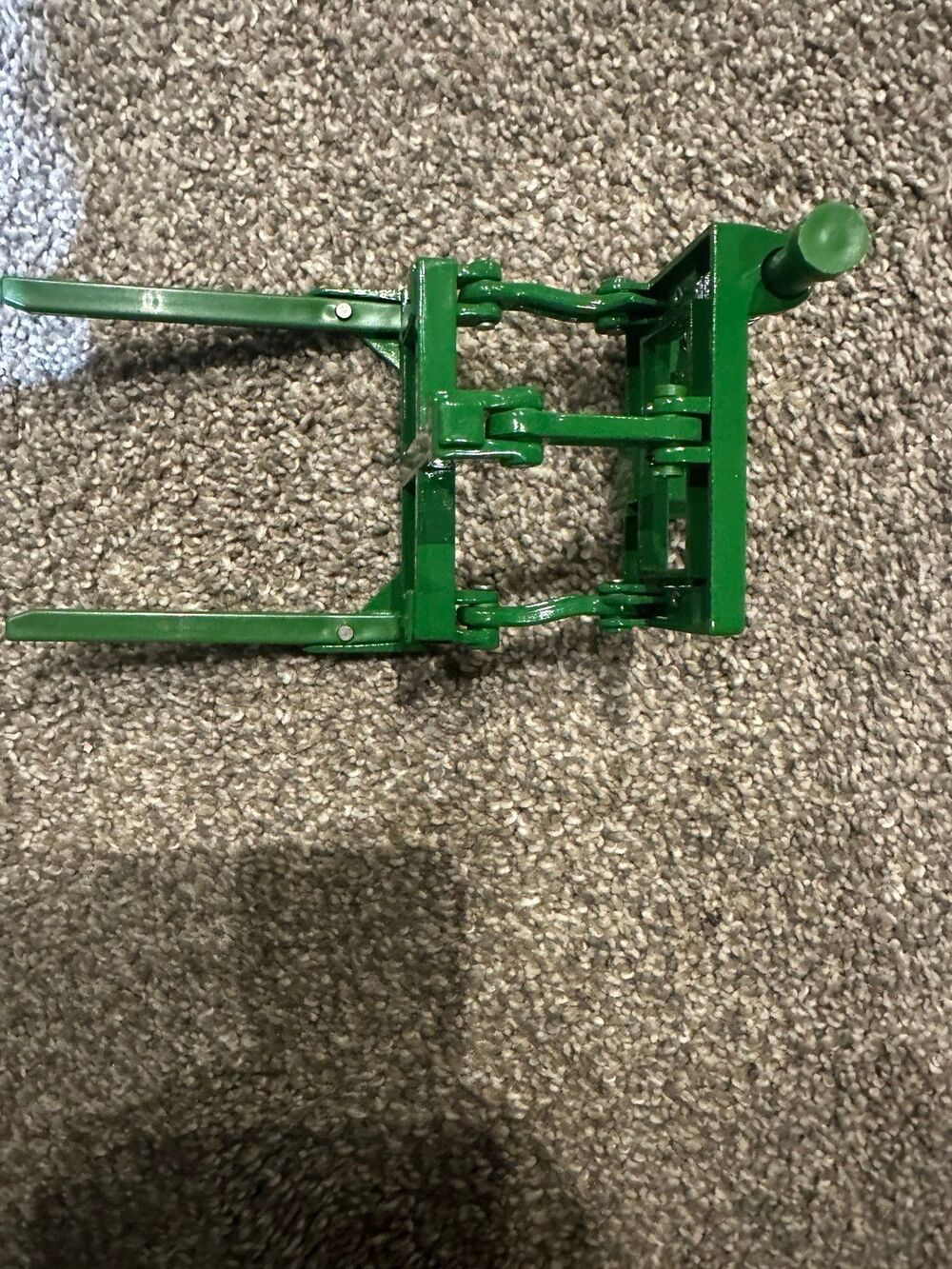 Ertl metal fork lift to attach to John Deere toy tractor